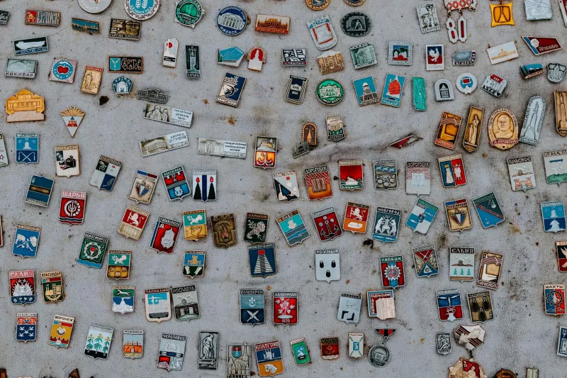 Skip the White Wall: Why Digital Artists Are Selling Their Art as Enamel Pins and Plush Toys